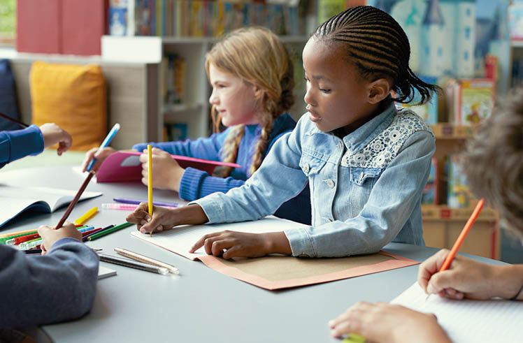 Children at modern school facility